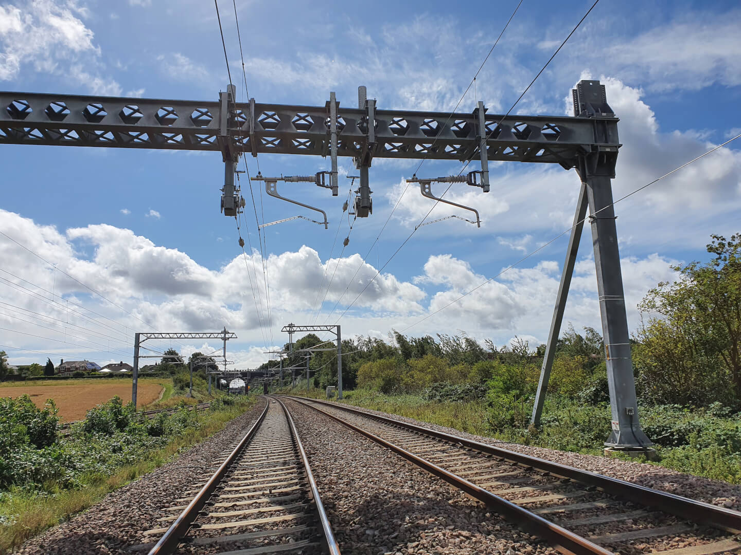 Overhead electrification lines on a railway track