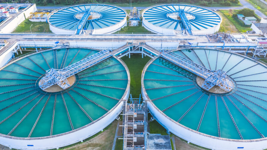Industrial water treatment‎ example of water engineer environment from aerial top view recirculation solid contact clarifier sedimentation tank